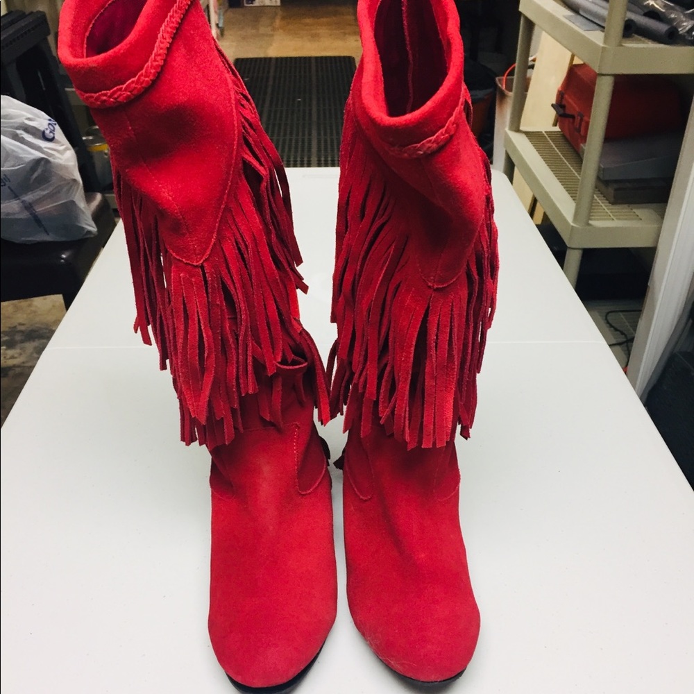 Women’s red fringed knee boots